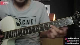 A Shady Umbrella for a Woman in a Hug Guitar Tutorial