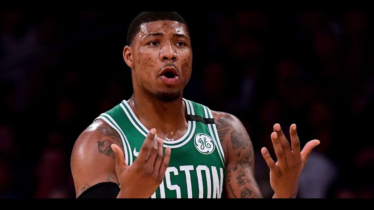 Marcus Smart admits he cut his hand by hitting a picture frame