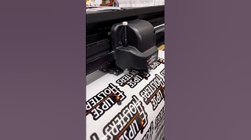 Cutting custom stickers. #printshop #stickers #customstickers