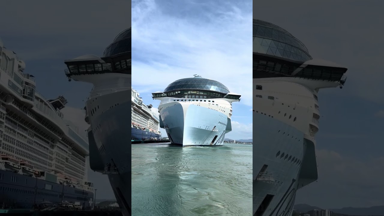 Icon of the Seas backing out of port in San Juan, with the Celebrity Beyond at the same dock.