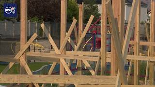 Residents fight against huge backyard construction project