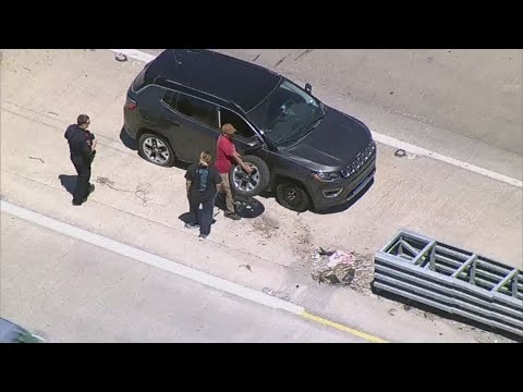 Major pothole on U.S. 75 damages cars, shuts down lane - YouTube