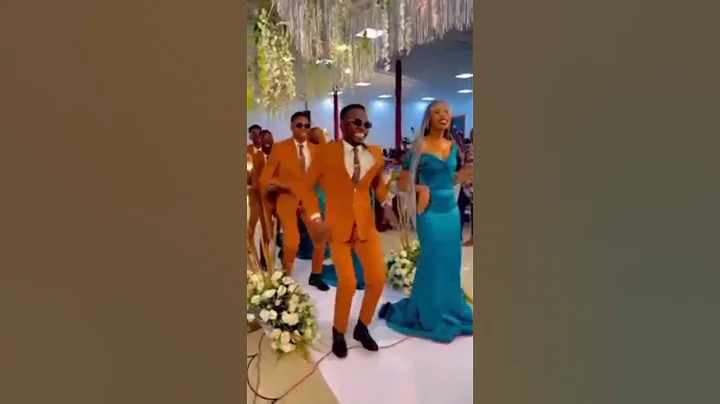 Bridal entrance,check out this grooms men on gold suit, bridal ladies on blue long dress.decorations - DayDayNews