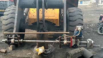 JCB LOADER BOOM LINE BORING