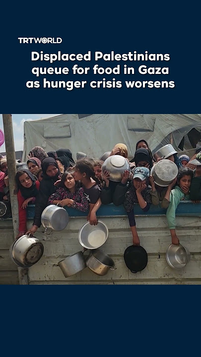 Displaced Palestinians queue for food in Gaza as hunger crisis worsens