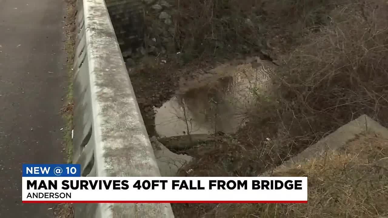 Man rescued after falling 40 feet from bridge - YouTube