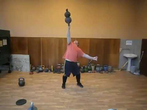 Подъем гири на попа
