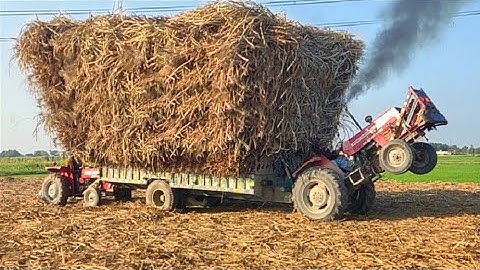 Tractors Stunt || massey tractor 375 loaded trolley pulling out on the mud || tractor video