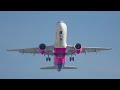 Красивый взлет Airbus 320 WIZZAIR, вид с торца полосы