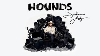 Video thumbnail of "Jordan Feliz - "Wounds" (Official Audio Video)"