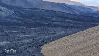 PEOPLE WALKING ON LAVA 