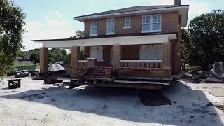 Crowds watch Historic McNab House being moved to new location