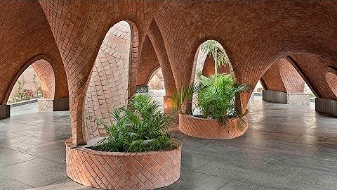 the grid architects sculpts gently swelling vaults for TARANG pavilion in india