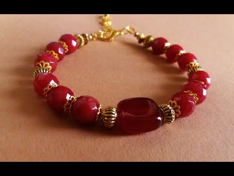 ქალის სამაჯური „მეწამული მზე“  შინდისფერი ჟადეიტის ქვებით და აგატით