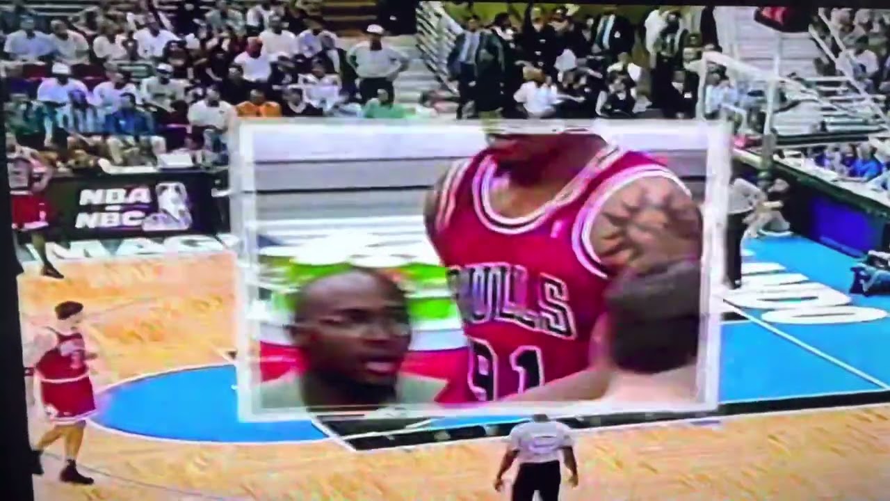 Dennis Rodman reacts in disgust to the foul call in front of Steve Javie and gets T’d up (1996)