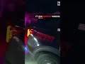 Officer explains breath test procedure during arrest transport
