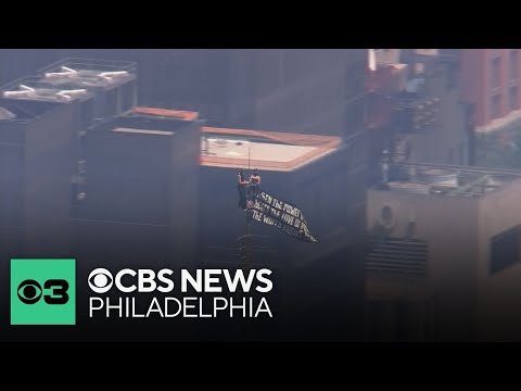 Couple climbs to top of Empire State Building in New York City