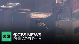 Couple climbs to top of Empire State Building in New York City