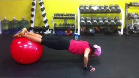 Trainer Teresa Performs on Ball (Core Thrasher)