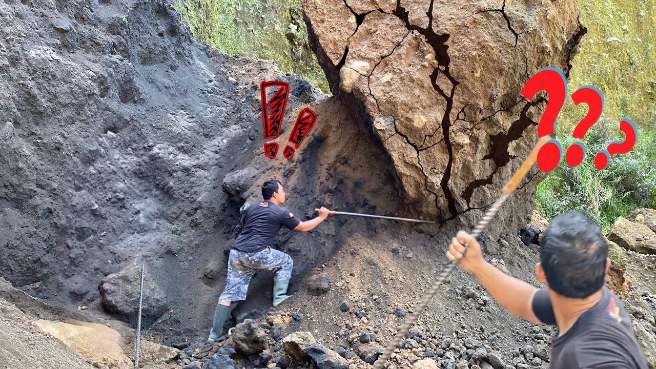 Very crazy..!!! the dangerous act of rolling a large rock - YouTube