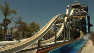 Six flags hurricane harbor los angeles, the water park adjacent to
magic mountain officially opened their all new trap-door slides,...