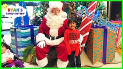 Ryan and Babies first time meeting the real Santa Claus at Disney! 