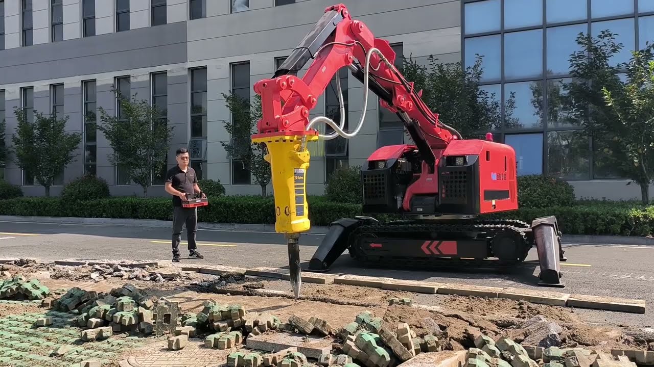 The crushing operations of demolition robots in road construction.
