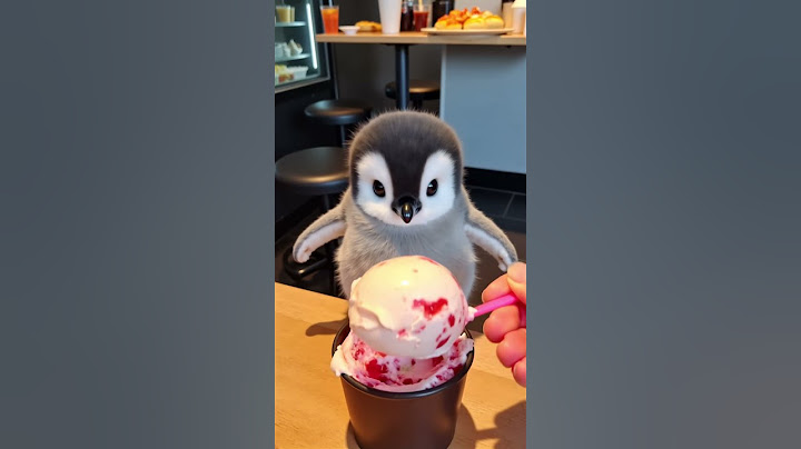 The little penguin eats a big ice cream #cute #cuteanimal #ai #penguin #funny #petlovers