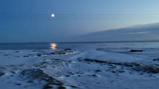 Iceland's beauty - Half moon with reflection in sea