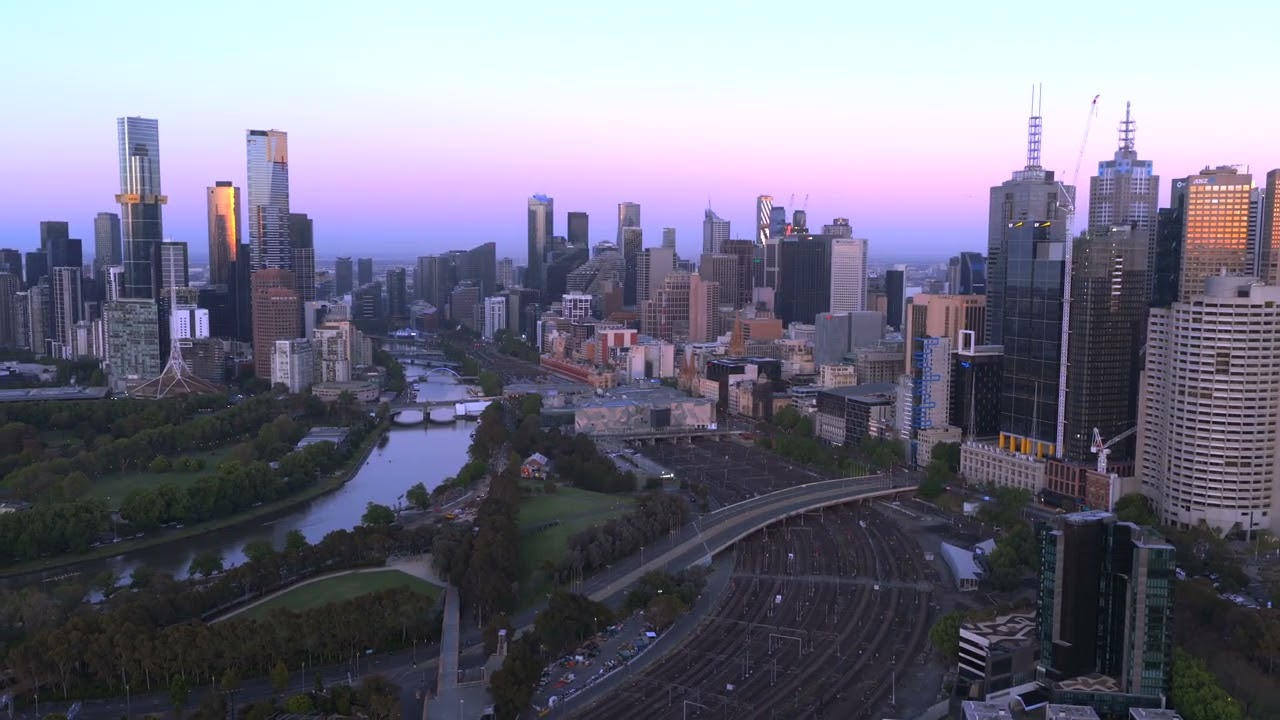 Morning flight over Melbourne CBD in 4K
