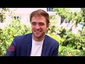 Robert pattinson raconte sa rencontre avec son hros ric cantona  festival de cannes 2017