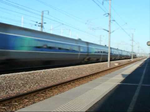 Mix of whistling high-speed trains in France: TGV Haute-Picardie train station on LGV-Nord rail line. Champagne-Ardenne TGV train statio on LGV-Est rail line. Each TGV (gray-blue) train set & Thalys (maroon-gray) is 200m long, two power cars and eight carriages. Eurostar (yellow-white) is ~400m long, two power cars and 18 carriages. So you can calculate the speed if you have time stopper. 19 dec. 2009 (from my Eurotrip-9) soundtrack: 1) Airbase - Theme From The Rock [remix] 2) William Orbit - Adagio For Strings [Paul Oakenfold mix] 3) The Doors - People Are Strange [Infected Mushroom Remix] 4) Infected Mushroom - Franks