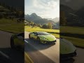 cinematic drone shot of a Lamborghini Huracán 2024 driving fast on a Swiss countryside road, surr...
