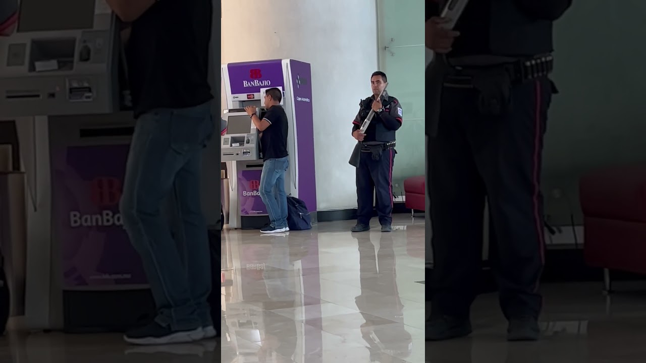 Armed guard @ ATM machine