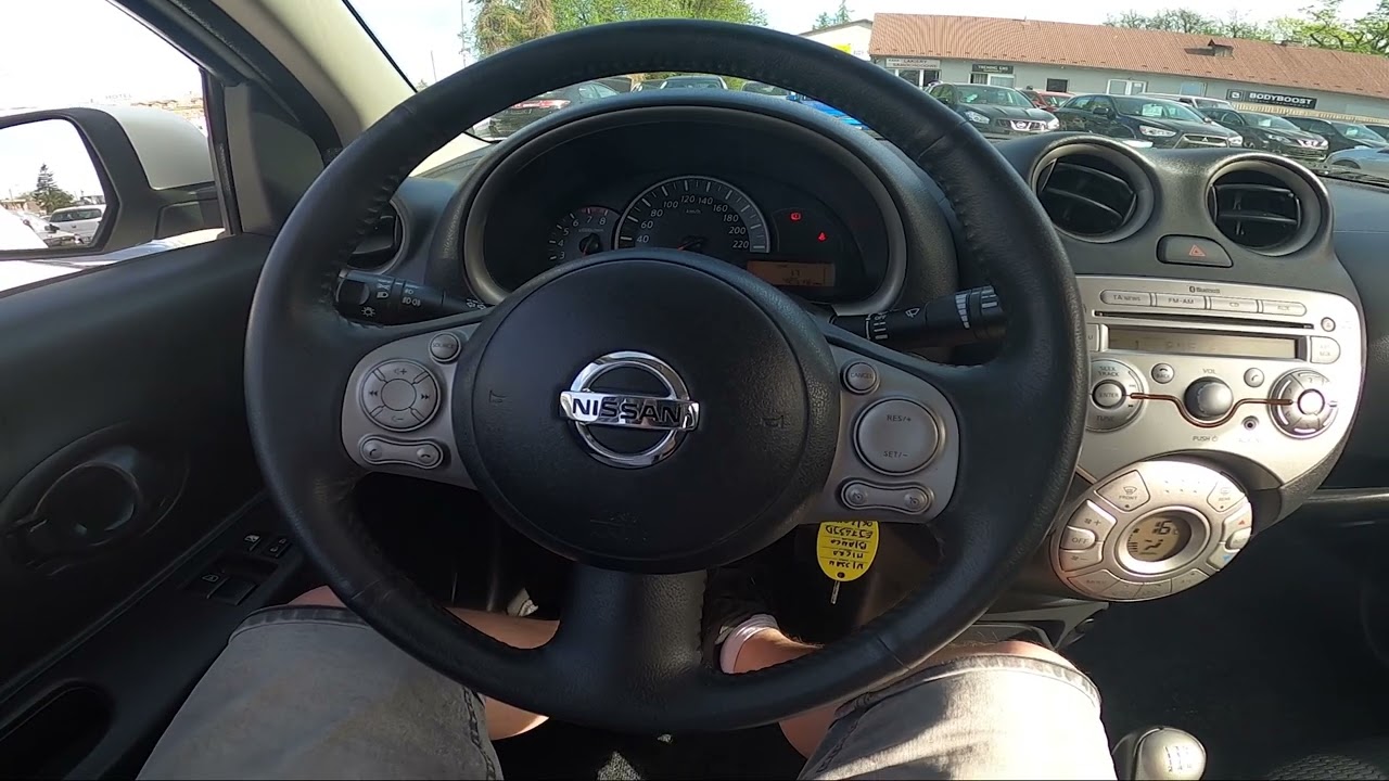 Where is Power Outlet in Nissan Micra IV ( 2010 – 2017 )