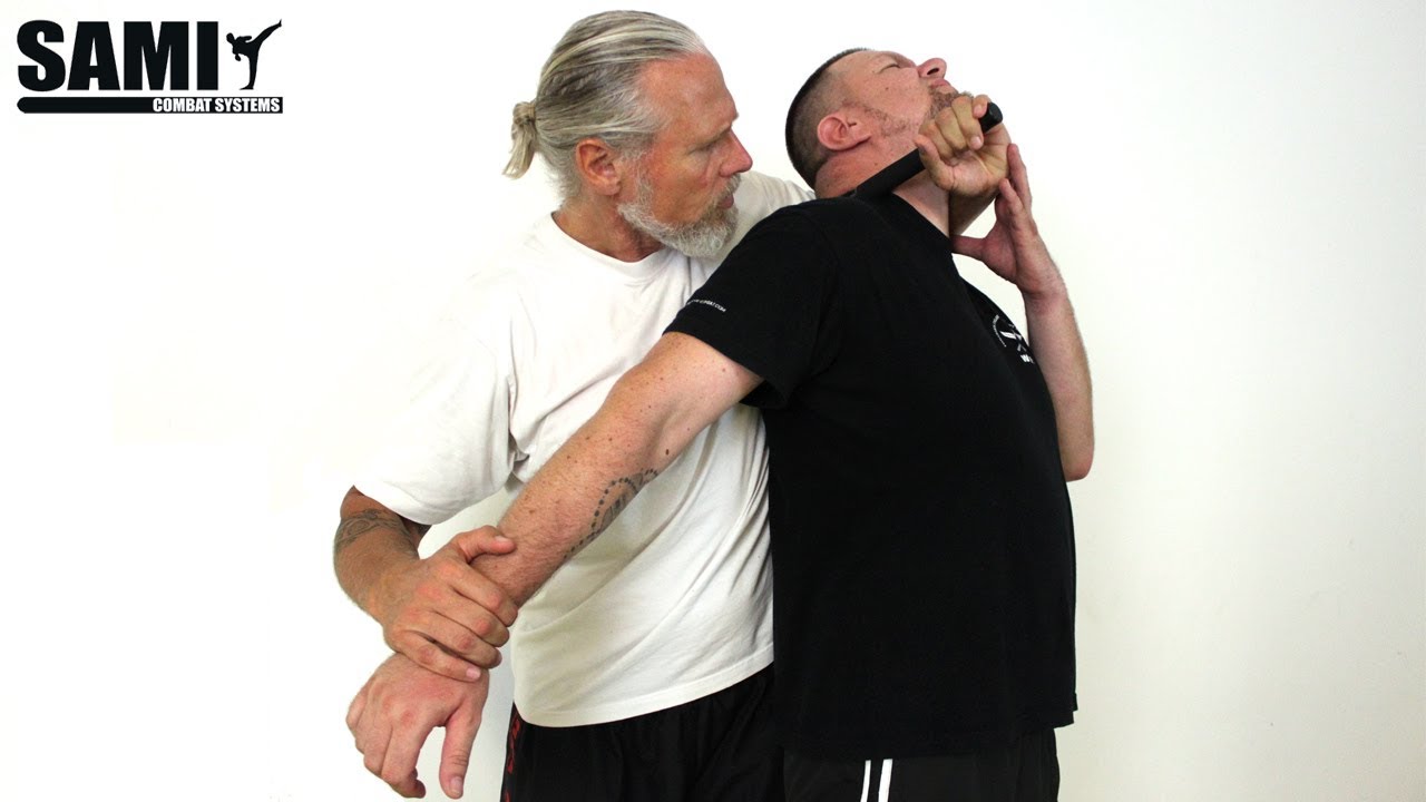 SAMI Expandable Baton Variation Arm Press And Control Position