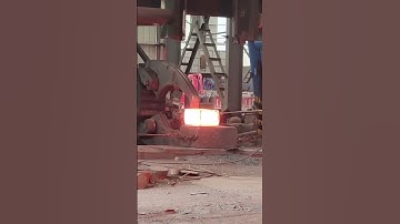 Ultra dangerous heavy-duty forging, high-temperature forging of a 1000 degree rectangular iron block