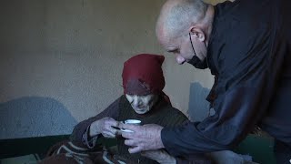 A Kosovar Albanian Cares For 92-Year-Old Ethnic Serb In An Abandoned Village