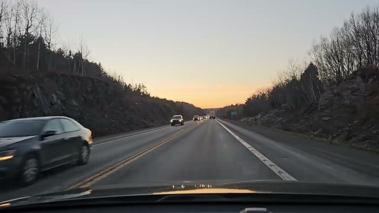 Beautiful winter sunset drive on Highway 101 from New Minas towards Coldbrook, Nova Scotia, Canada. 