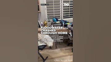 Surge of floodwater crashes through Utah family