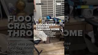 Surge of floodwater crashes through Utah family's home