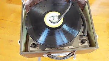 Columbia 360K 4 speed automatic record player playing an LP