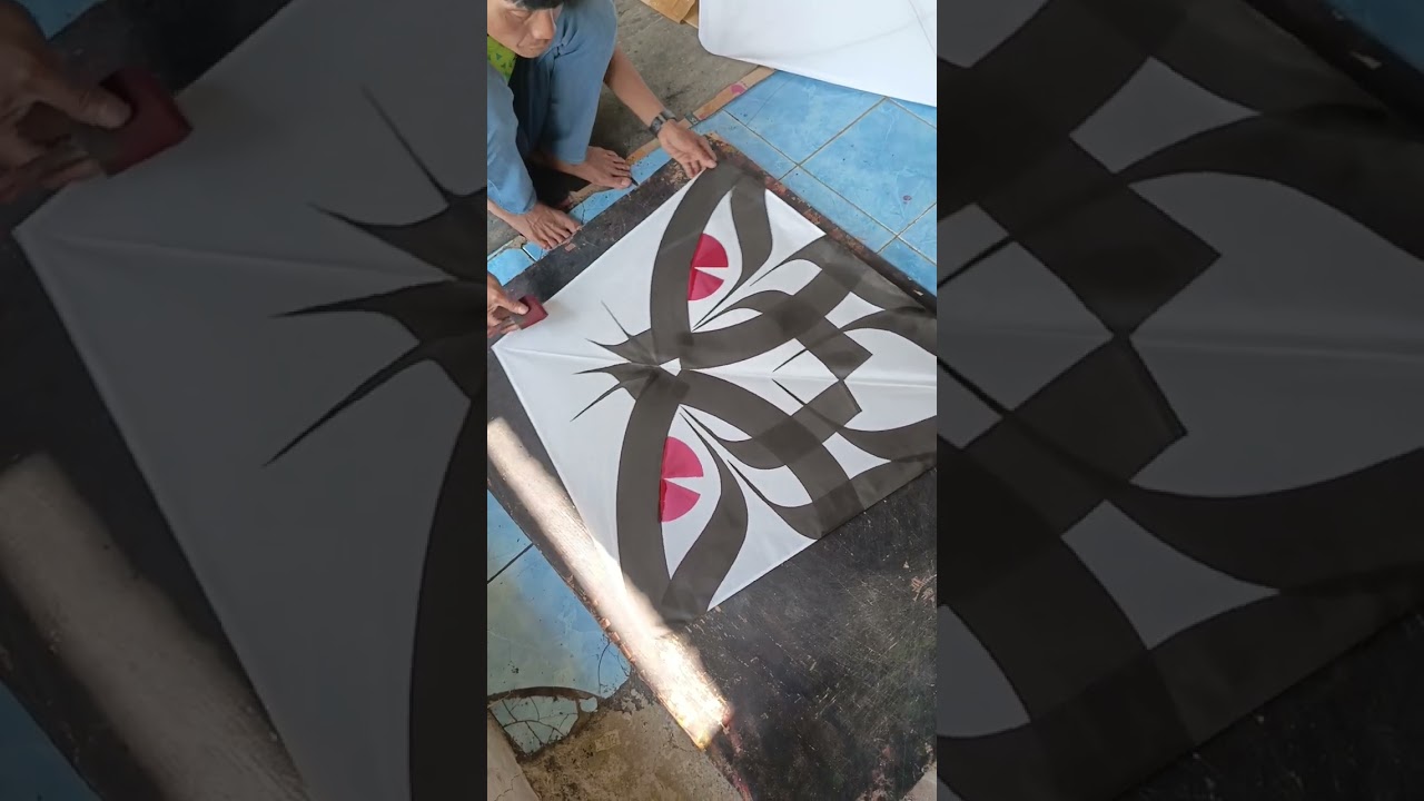 Cap layangan motip culiwek kupu-kupu