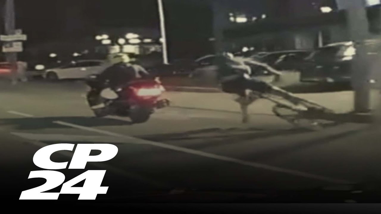 Motorcyclist intentionally hits cyclist in downtown Toronto bike lane ...