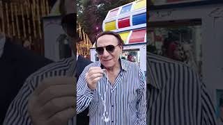 الزعيم في وسط البلد بالحراسات   شبيه عادل إمام بيعيد على الناس في شوارع القاهرة  أنا الزعيم