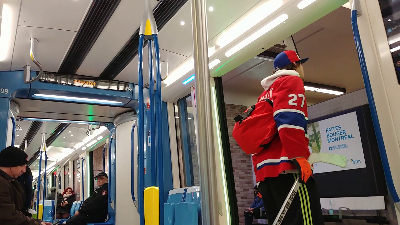 Part 1 Crazy hockey fan with a hockey stick in the metro PROFANITY
