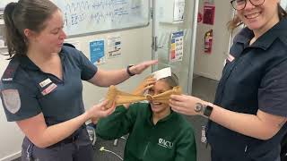 Applying a bandage to a bleeding head