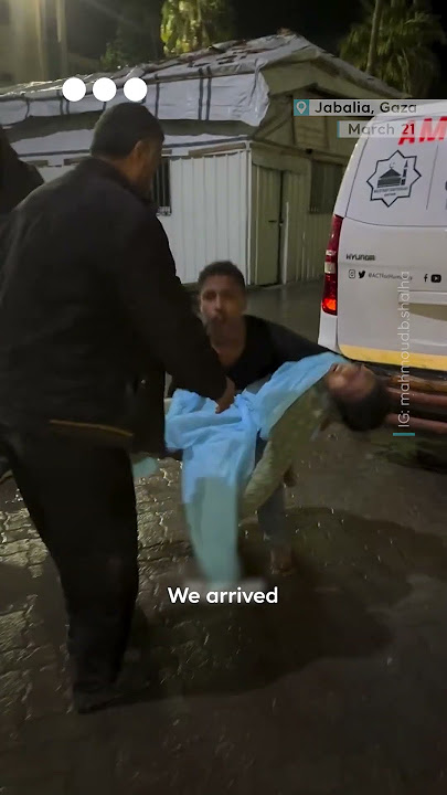 Palestinian boy carries sister's body amid Israel's bombing of Gaza