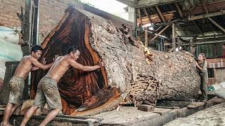 Heavy Equipment Moving Massive Timber In Wood Processing Plant