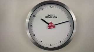 Clock With Rotating Logo Avery